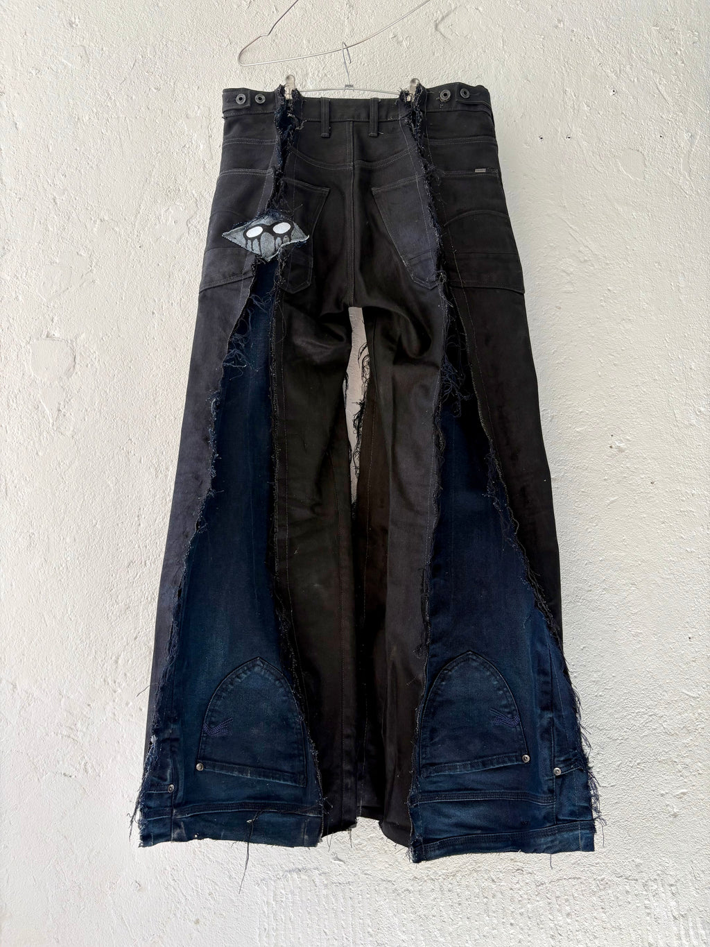 FLARED DARK DENIM PATCHED SCRAP SPG PANTS