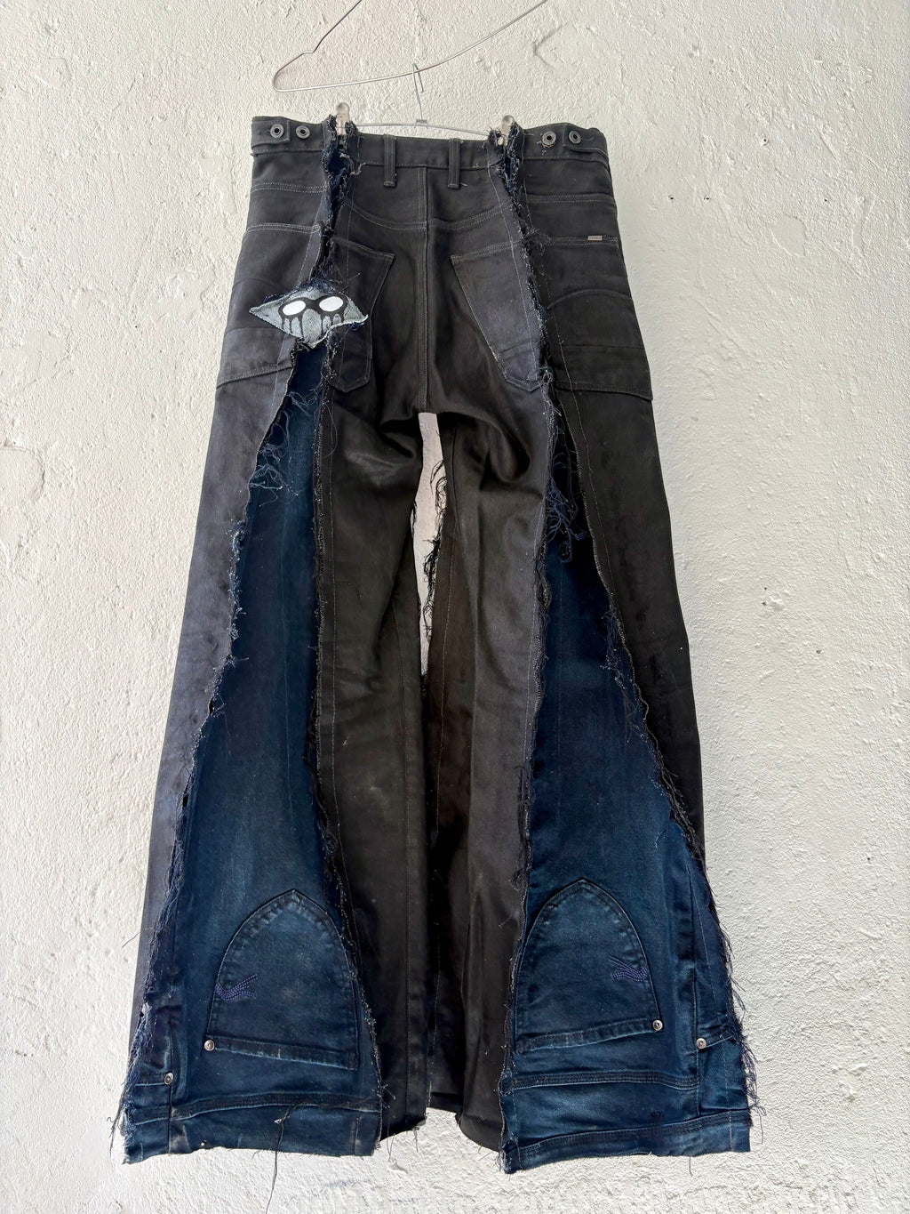 FLARED DARK DENIM PATCHED SCRAP SPG PANTS